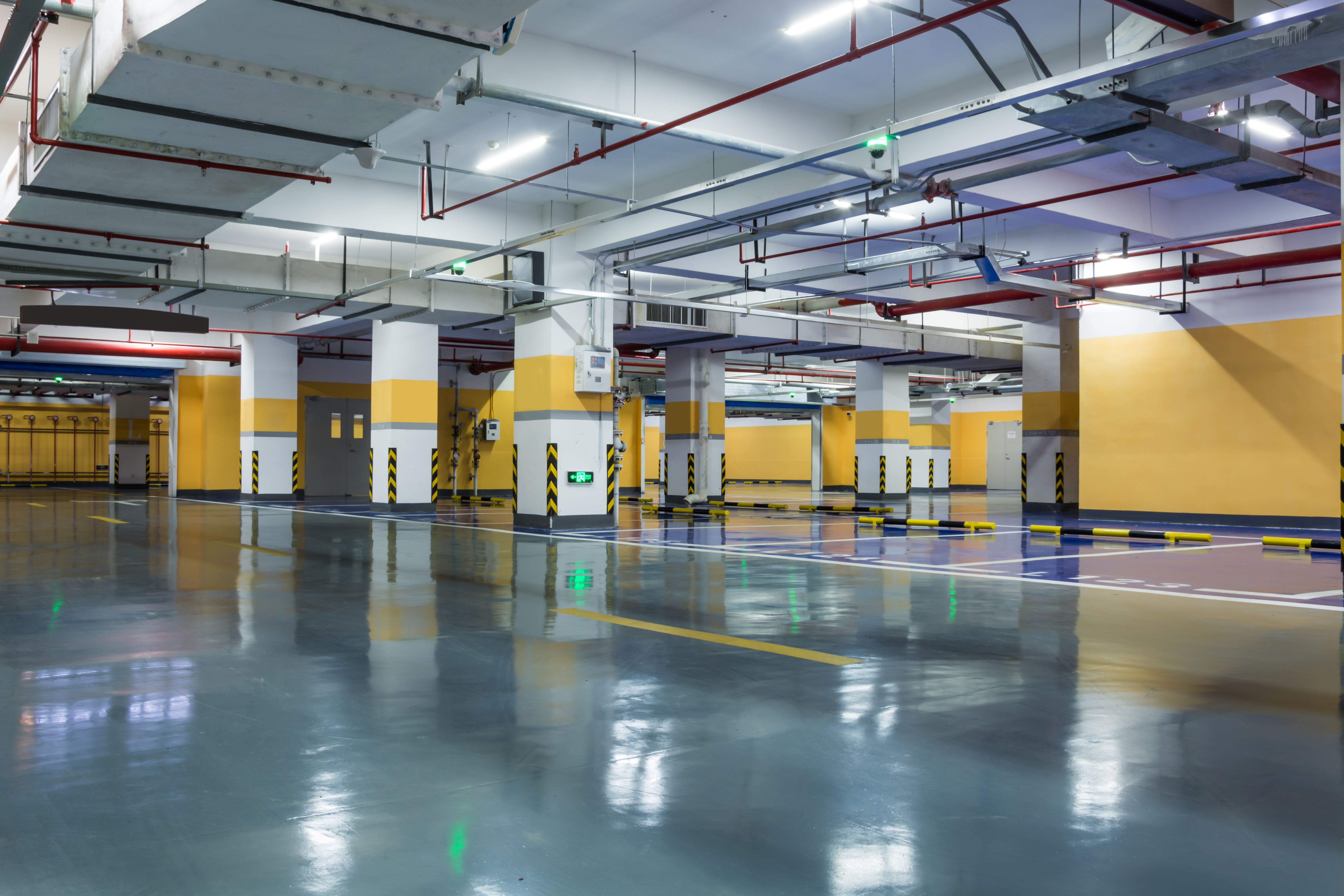 Glossy epoxy-coated floor in a parking garage